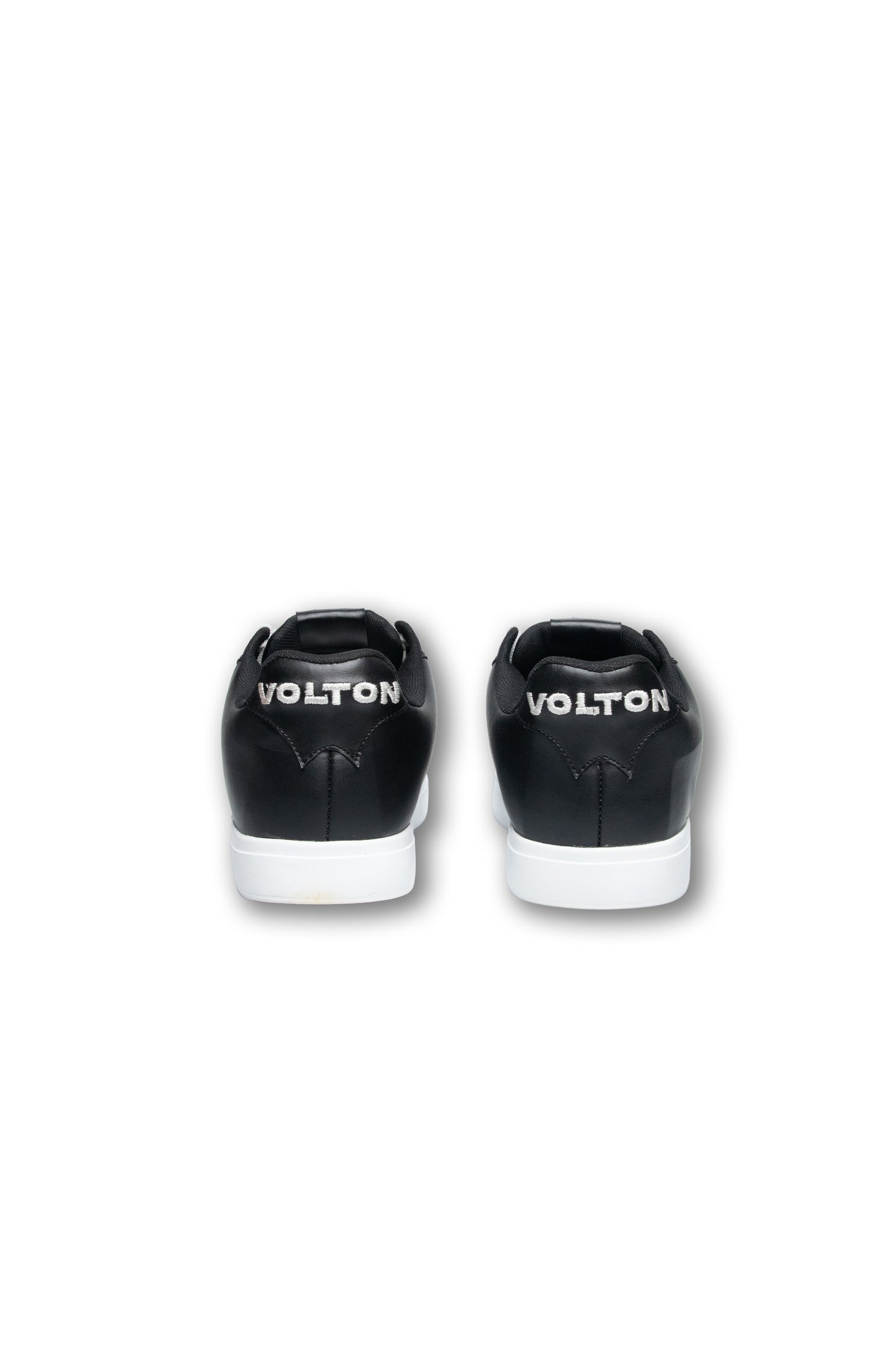Black sneakers with white soles and 'VOLTON' branding on a white background