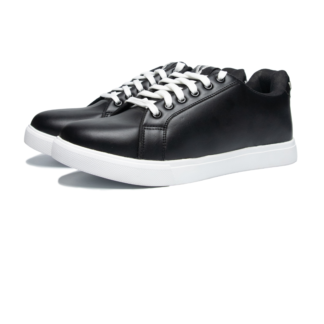 Black sneakers with white laces on a white background