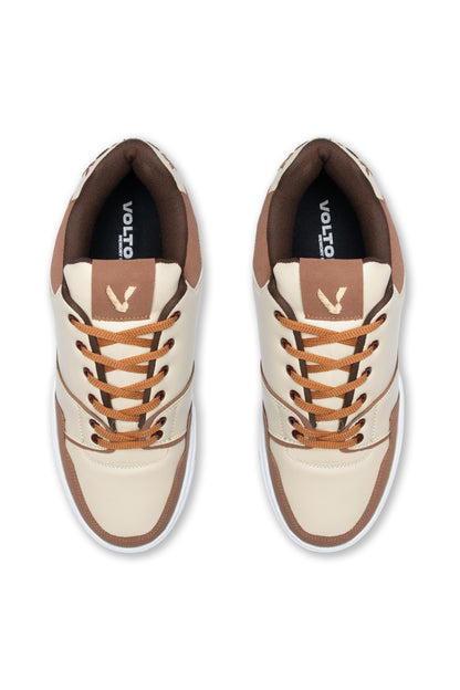 Pair of cream and brown sneakers with visible Volio branding on a white background